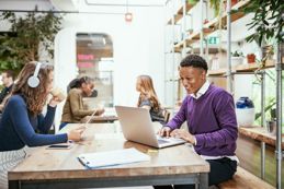 Employees working individually on a table