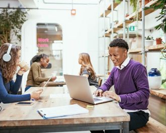 Employees working individually on a table
