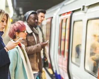 Commuters waiting on an underground platform