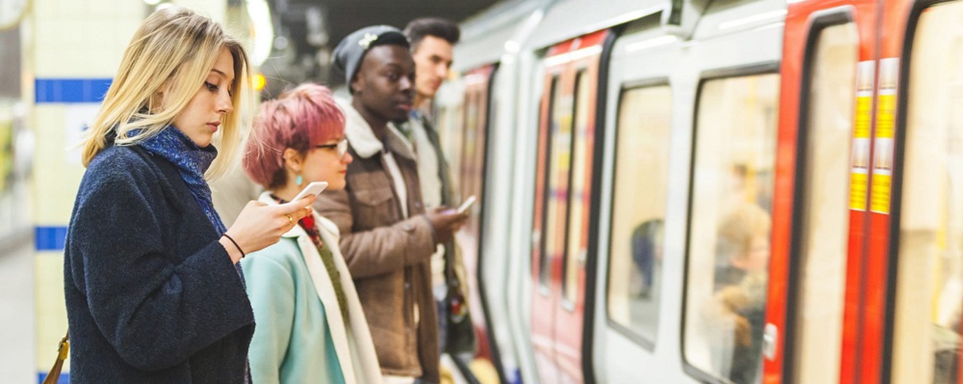 Commuters waiting on an underground platform