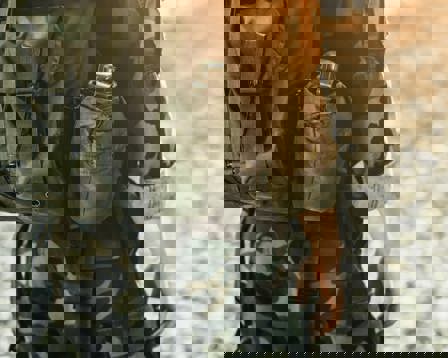 Soldier in military kit performing tasks