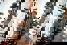 Doing make-up at a beauty salon