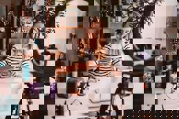 Young woman doing video blog about her make up