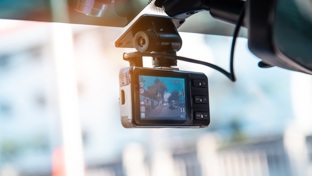 Close up of a dash cam in a car