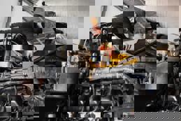 Mechanic repairing truck engine